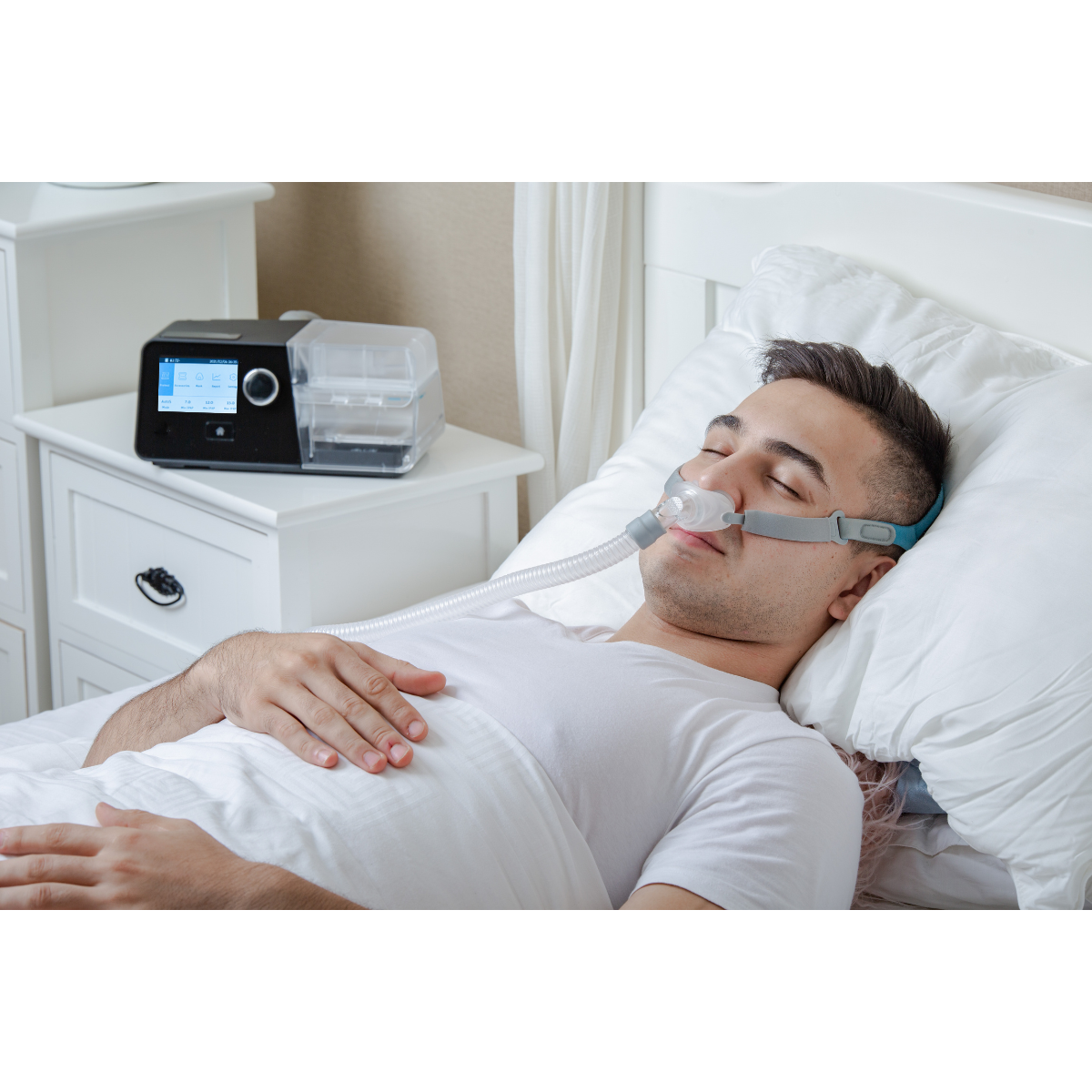 Patient resting with PAP device